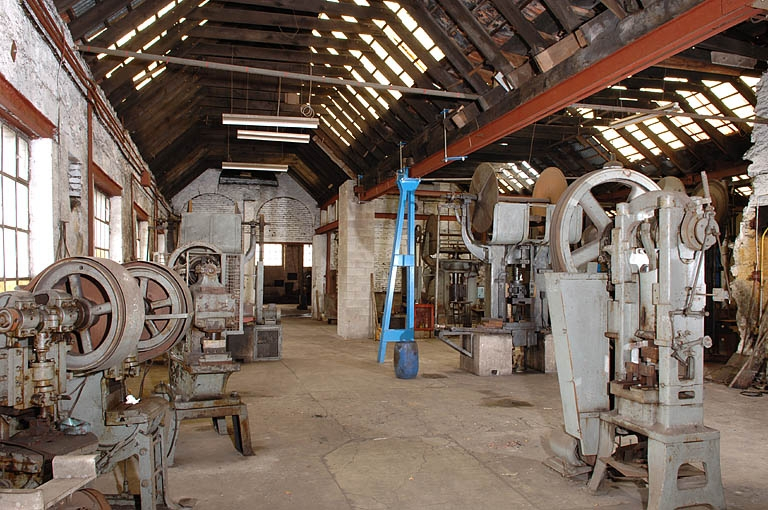 Travée sud-ouest de l'atelier dit des Balanciers. © Jérôme Mongreville / Région Bourgogne-Franche-Comté, Inventaire du patrimoine - 2005 Travée sud-ouest de l'atelier dit des Balanciers. © Jérôme Mongreville / Région Bourgogne-Franche-Comté, Inventaire du patrimoine - 2005