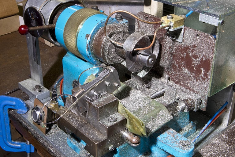 Lame et monture dans le porte-pièce. © Yves Sancey / Région Bourgogne-Franche-Comté, Inventaire du patrimoine - 2010