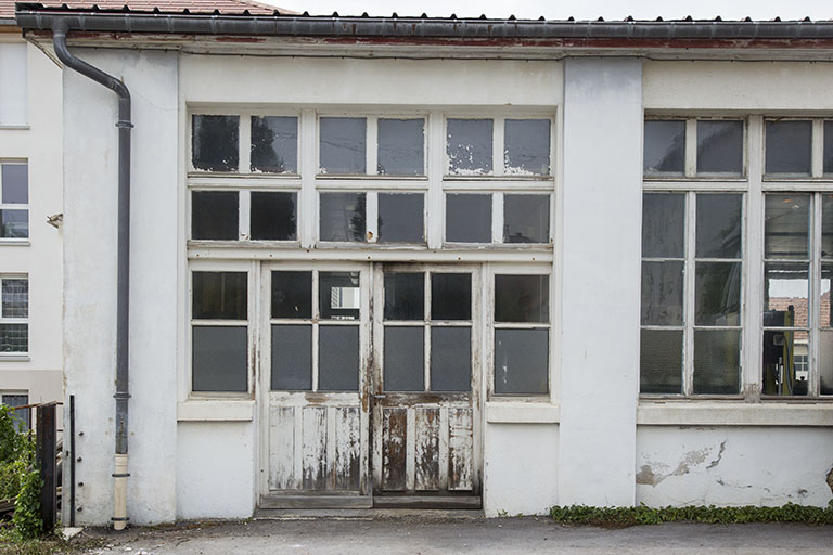 Extension : dernière travée sur la rue Pasteur. © Yves Sancey / Région Bourgogne-Franche-Comté, Inventaire du patrimoine - 2012 Extension : dernière travée sur la rue Pasteur. © Yves Sancey / Région Bourgogne-Franche-Comté, Inventaire du patrimoine - 2012