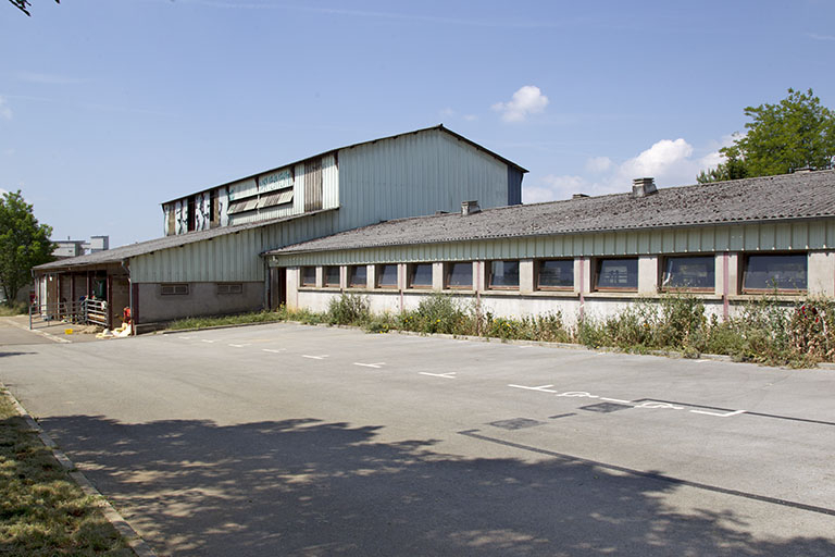 Façades est de l'étable est et de l'entrepôt agricole. © Sonia Dourlot / Région Bourgogne-Franche-Comté, Inventaire du patrimoine - 2014