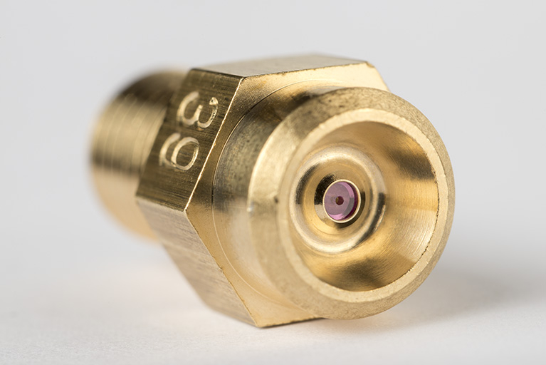 Gicleur de chaudière équipé de sa pastille en rubis synthétique. © Sonia Dourlot / Région Bourgogne-Franche-Comté, Inventaire du patrimoine - 2014