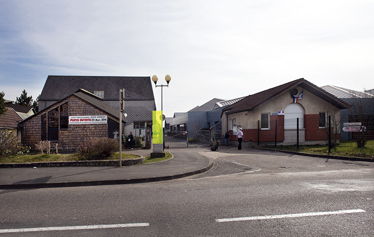 Entrée nord-ouest de la rue d'Alembert, donnant sur la place, via la rue vers le nord. © Mary Ruffinoni / Région Bourgogne-Franche-Comté, Inventaire du patrimoine - 2014