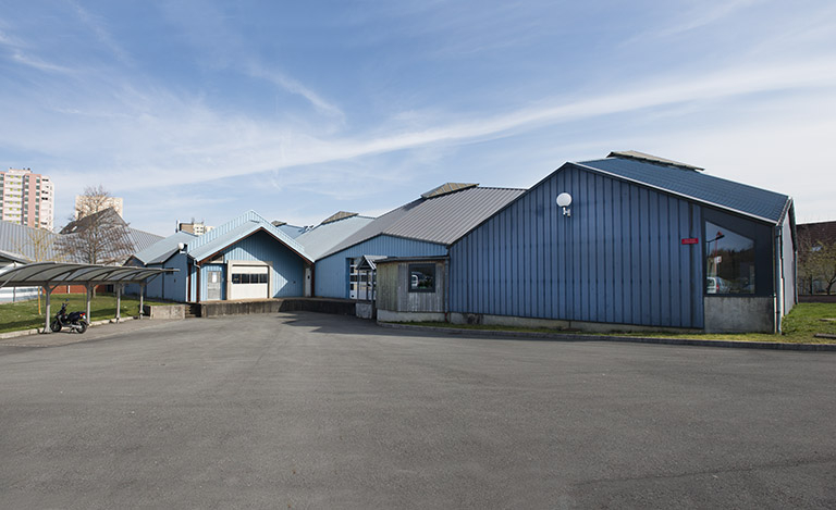 Façades postérieures ouest des ateliers de mécanique. © Mary Ruffinoni / Région Bourgogne-Franche-Comté, Inventaire du patrimoine - 2014
