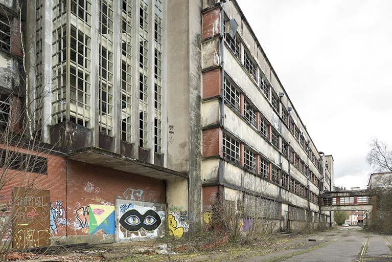 Etat en 2016. Usine A : façade nord du bâtiment de filature et tissage. © Sonia Dourlot / Région Bourgogne-Franche-Comté, Inventaire du patrimoine - 2016
