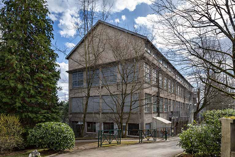 Entrepôt industriel, vu depuis le nord. © Jérôme Mongreville / Région Bourgogne-Franche-Comté, Inventaire du patrimoine - 2019 Entrepôt industriel, vu depuis le nord. © Jérôme Mongreville / Région Bourgogne-Franche-Comté, Inventaire du patrimoine - 2019