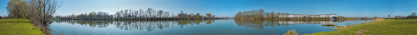 Vue panoramique de la Saône depuis l'entrée de la darse : en face, le port nord et au fond, le pont de Bourgogne. © Région Bourgogne-Franche-Comté, Inventaire du patrimoine