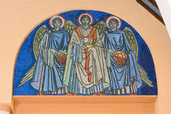 Détail du tympan de l'arcade droite de la tribune. © Région Bourgogne-Franche-Comté, Inventaire du patrimoine Détail du tympan de l'arcade droite de la tribune. © Région Bourgogne-Franche-Comté, Inventaire du patrimoine