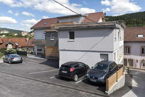 Façade postérieure : bâtiment de 1913 environ (à gauche) et extension de 1950. © Région Bourgogne-Franche-Comté, Inventaire du patrimoine