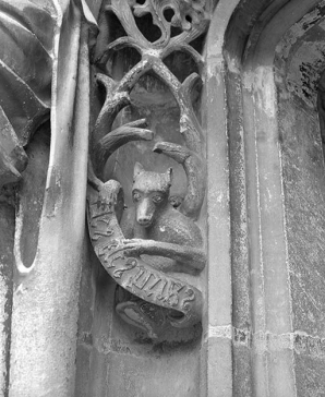 Décor sculpté (animal tenant une banderole avec une inscription). © Région Bourgogne-Franche-Comté, Inventaire du patrimoine