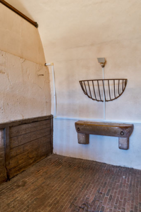 Ecurie, partie occidentale : intérieur d'une stalle. © Région Bourgogne-Franche-Comté, Inventaire du patrimoine