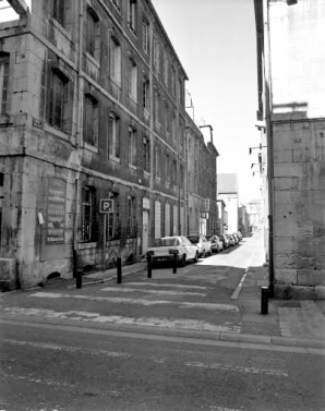 Immeuble : vue de la façade donnant rue Jean Petit : de trois quarts gauche. © Région Bourgogne-Franche-Comté, Inventaire du patrimoine