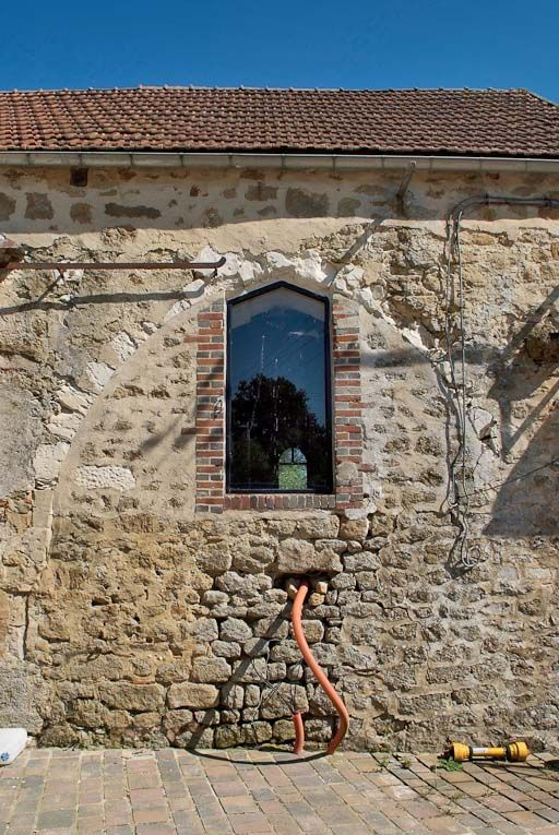 Chapelle : arcade en partie murée du mur de long-pan sur cour. © Pierre-Marie Barbe-Richaud / Région Bourgogne-Franche-Comté, Inventaire du patrimoine - 2008