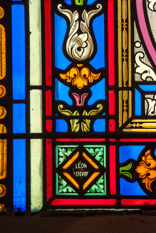 Verrière représentant St Hubert et St Laurent. Détail de la signature. © Pierre-Marie Barbe-Richaud / Région Bourgogne-Franche-Comté, Inventaire du patrimoine - 2015