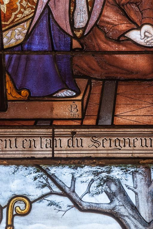 Détail de la signature de Besnard sur le vitrail de saint Cassien/saint Germain. © Pierre-Marie Barbe-Richaud / Région Bourgogne-Franche-Comté, Inventaire du patrimoine - 2016 Détail de la signature de Besnard sur le vitrail de saint Cassien/saint Germain. © Pierre-Marie Barbe-Richaud / Région Bourgogne-Franche-Comté, Inventaire du patrimoine - 2016