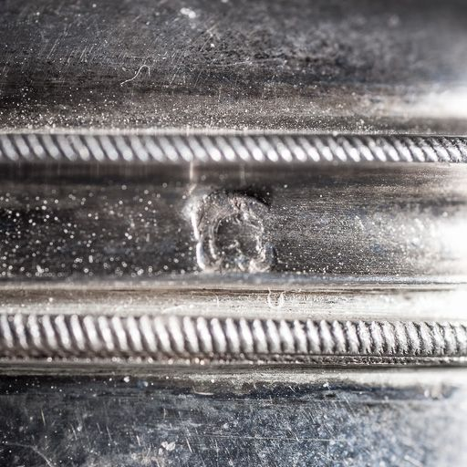 Poinçon : tête de Minerve. © Pierre-Marie Barbe-Richaud / Région Bourgogne-Franche-Comté, Inventaire du patrimoine - 2016