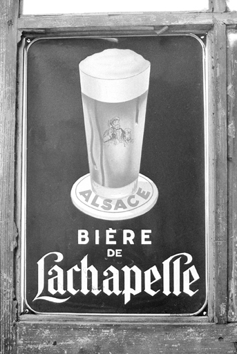 Plaque émaillée publicitaire. SRI. Enquête régionale sur les bâtiments industriels (1979-1981). © Jack Dumont / Région Bourgogne-Franche-Comté, Inventaire du patrimoine - 1980