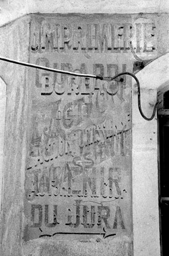 Détail de la publicité peinte. © Laurent Poupard / Région Bourgogne-Franche-Comté, Inventaire du patrimoine - 1989 Détail de la publicité peinte. © Laurent Poupard / Région Bourgogne-Franche-Comté, Inventaire du patrimoine - 1989