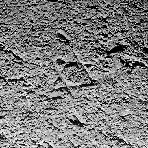 Traces de boucharde et signe lapidaire sur le revers de la façade au nord. © Jérôme Mongreville / Région Bourgogne-Franche-Comté, Inventaire du patrimoine - 1997