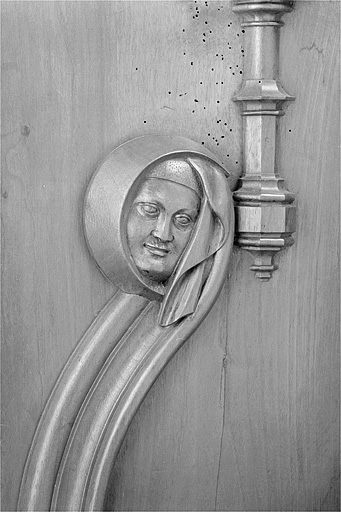 Appui-main à gauche de la huitième stalle basse. © Jérôme Mongreville / Région Bourgogne-Franche-Comté, Inventaire du patrimoine - 1998