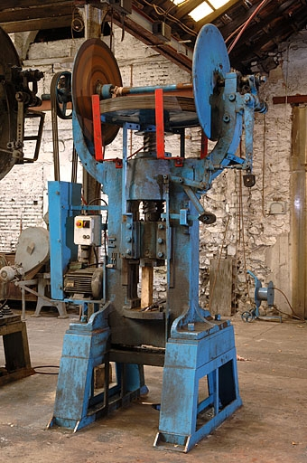 Vue de trois quarts d'une presse (E sur le plan de localisation). © Jérôme Mongreville / Région Bourgogne-Franche-Comté, Inventaire du patrimoine - 2005