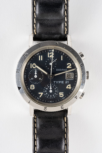 Exemple de production : montre Dodane type 21 (vue rapprochée). (Collection musée du Temps, Besançon). © Sonia Dourlot / Région Bourgogne-Franche-Comté, Inventaire du patrimoine - 2019 Exemple de production : montre Dodane type 21 (vue rapprochée). (Collection musée du Temps, Besançon). © Sonia Dourlot / Région Bourgogne-Franche-Comté, Inventaire du patrimoine - 2019