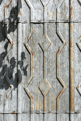 Façade latérale gauche : détail de l'essentage métallique. © Sonia Dourlot / Région Bourgogne-Franche-Comté, Inventaire du patrimoine - 2019